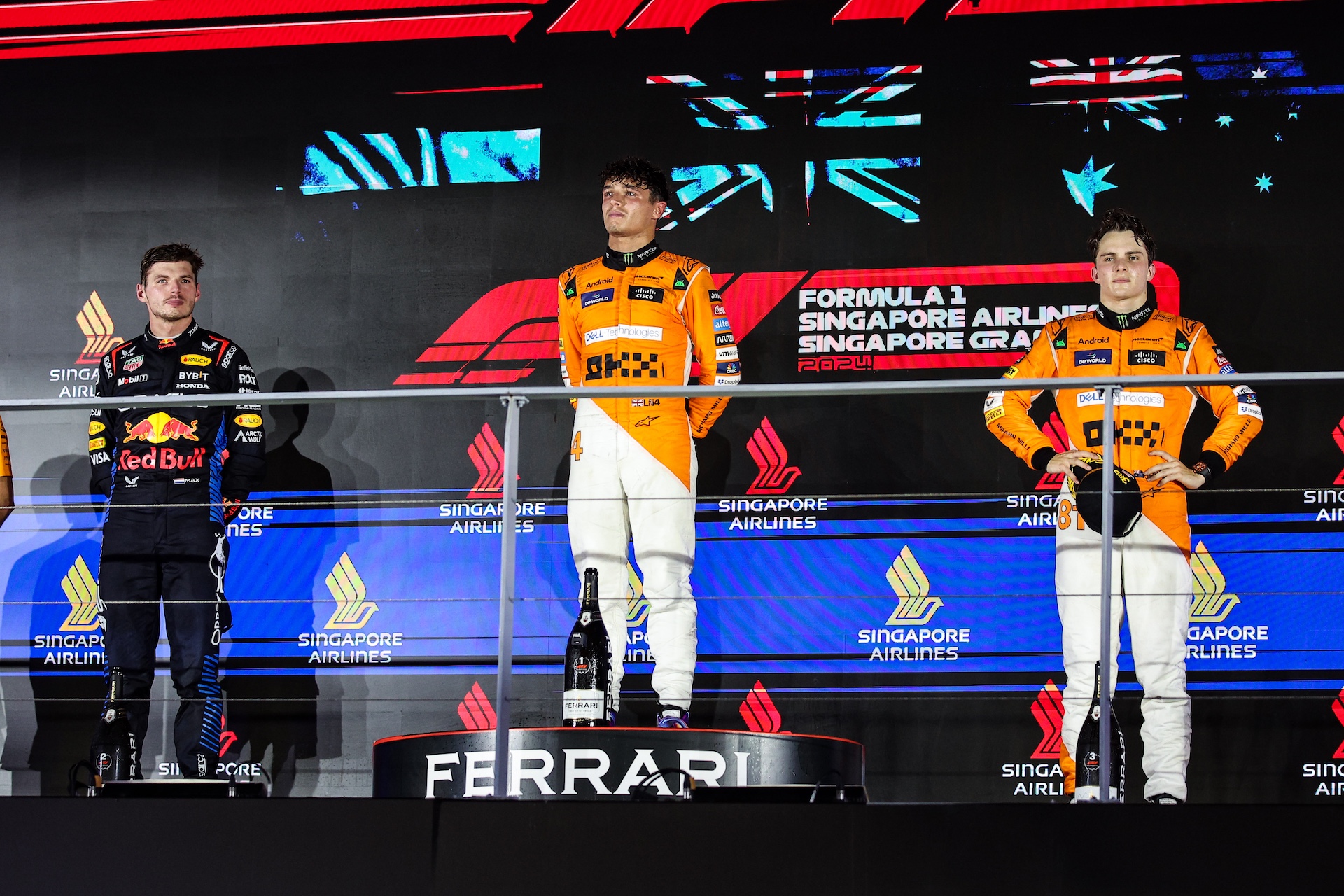 Lando Norris of McLaren F1 Team MCL38, Max Verstappen of Red Bull Racing RB20, and Oscar Piastri of McLaren F1 Team MCL38, during the Formula 1 Singapore Grand Prix 2024 on the Marina Bay Circuit, in Singapore, from September 19 to 22, 2024. (Photo by Gongora/NurPhoto)