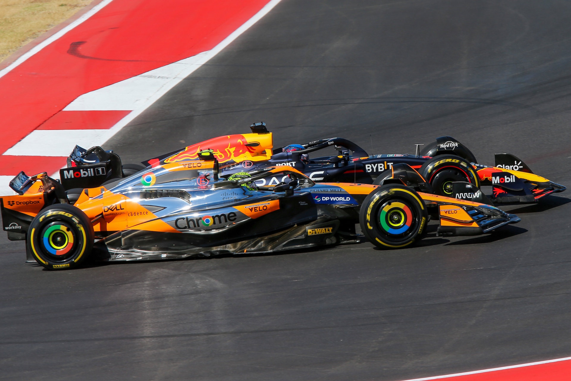 Max Verstappen of the Netherlands drives the Oracle Red Bull Racing RB20 Honda RBPT, and Lando Norris of the UK drives the McLaren F1 Team MCL38 Mercedes during the Formula 1 Pirelli United States Grand Prix 2024 in Austin, USA, on October 20, 2024. (Photo by Alessio Morgese/NurPhoto)