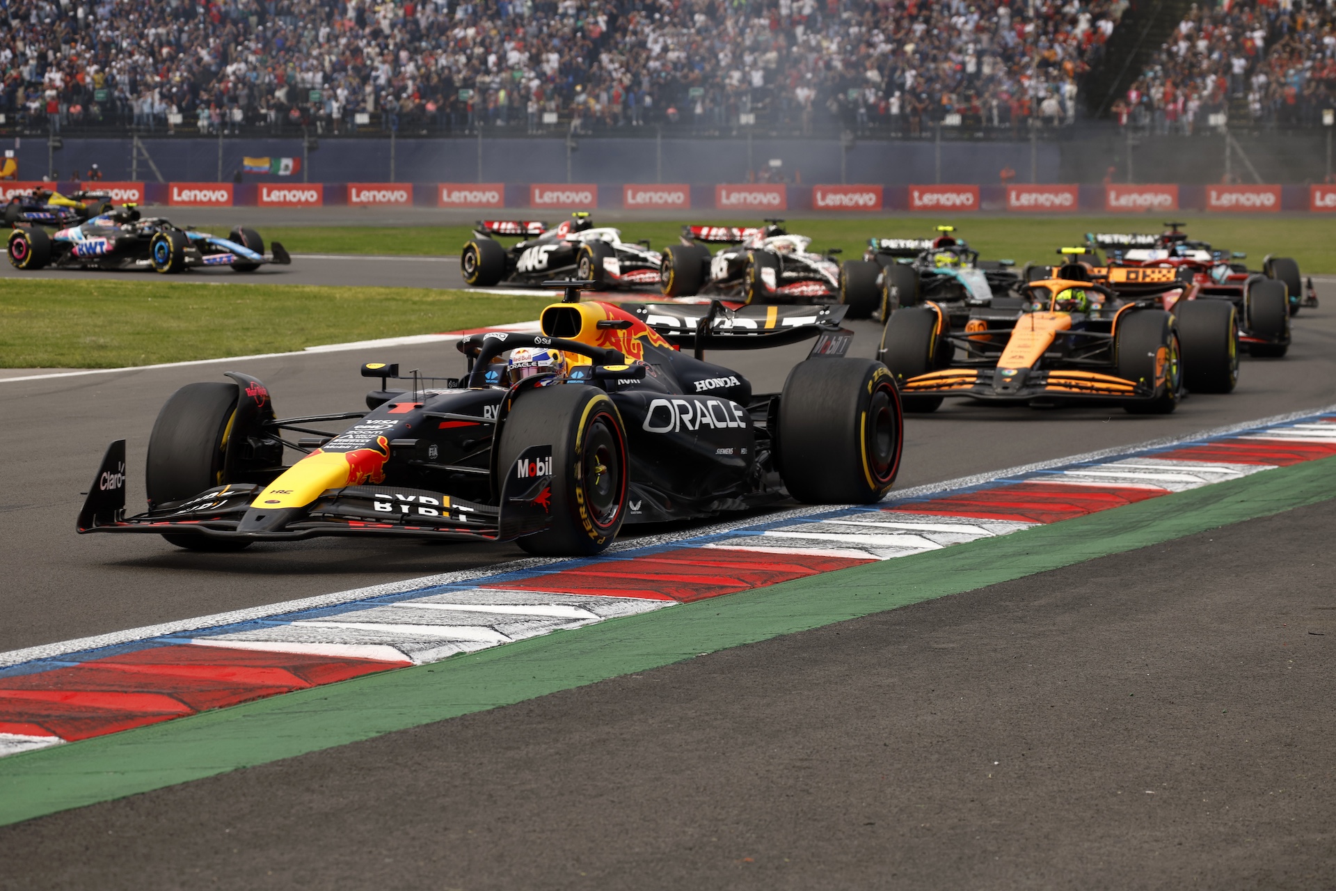 MEXICO CITY, MEXICO - OCTOBER 27: Max Verstappen of the Netherlands driving the (1) Oracle Red Bull Racing RB20 leads Lando Norris of Great Britain driving the (4) McLaren MCL38 Mercedes on track during the F1 Grand Prix of Mexico at Autodromo Hermanos Rodriguez on October 27, 2024 in Mexico City, Mexico. (Photo by Chris Graythen/Getty Images)