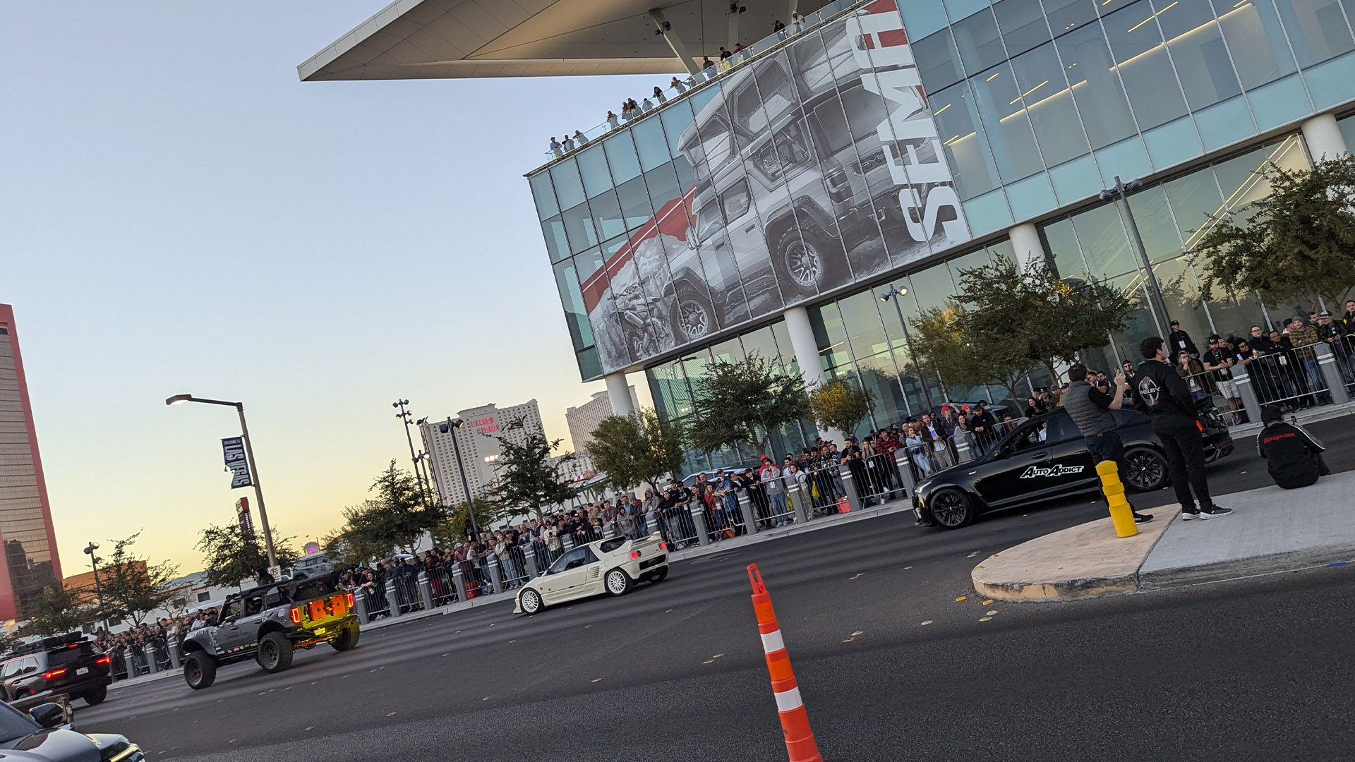 Custom mini car in front of crowd