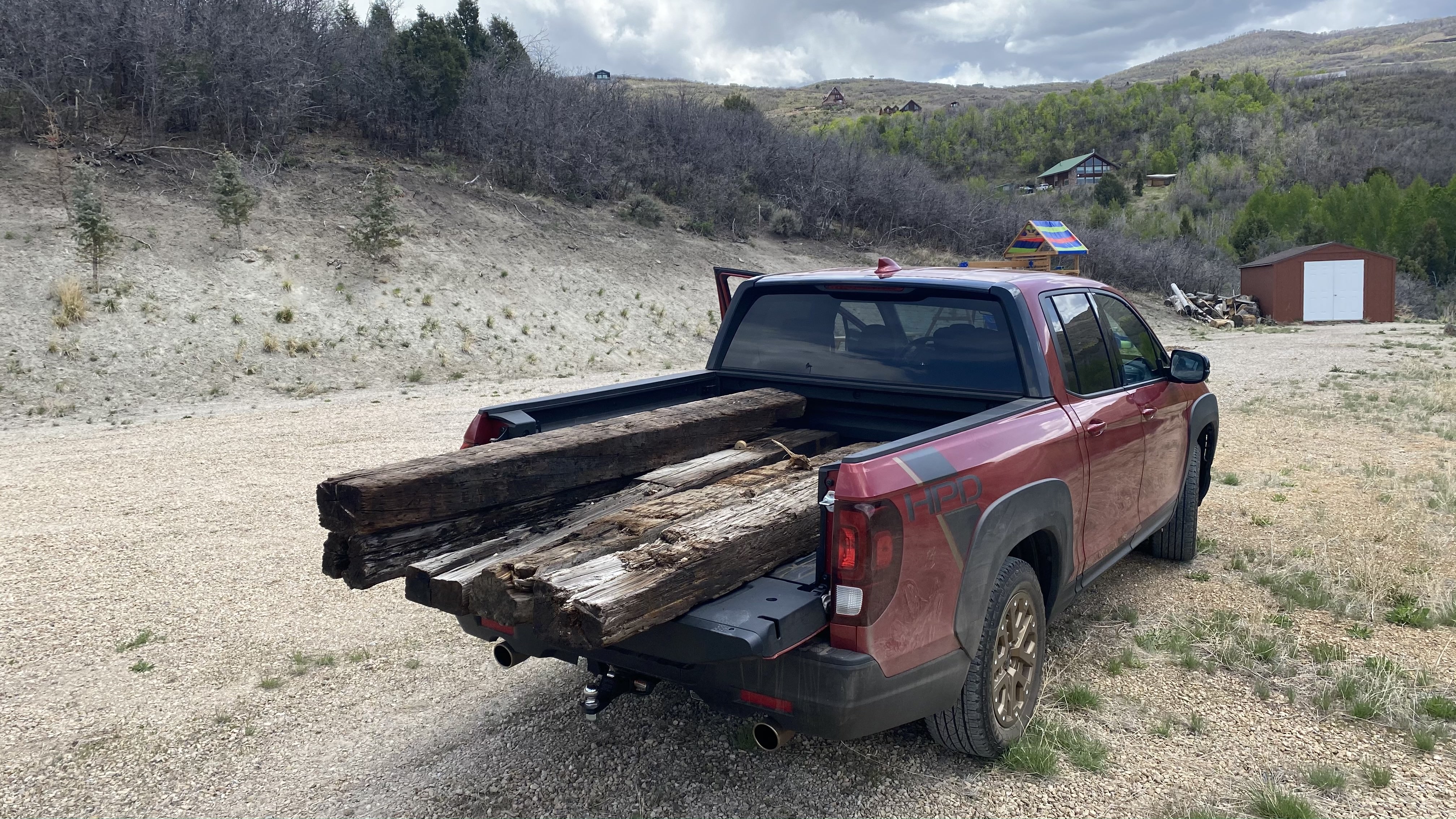 Ridgeline's bed full of railroad ties. 